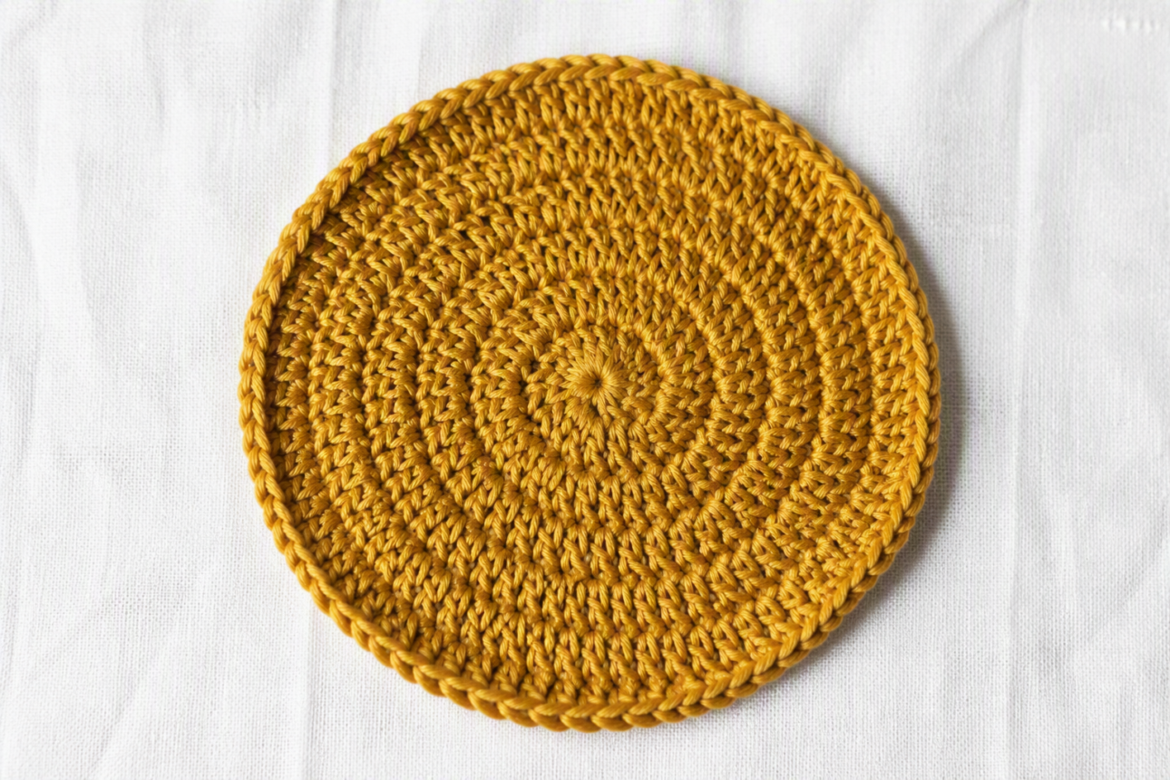 13 Simple Fall Crochet Coasters for Busy Homeowners 5 3. Beautiful Golden Spice Circular Coaster